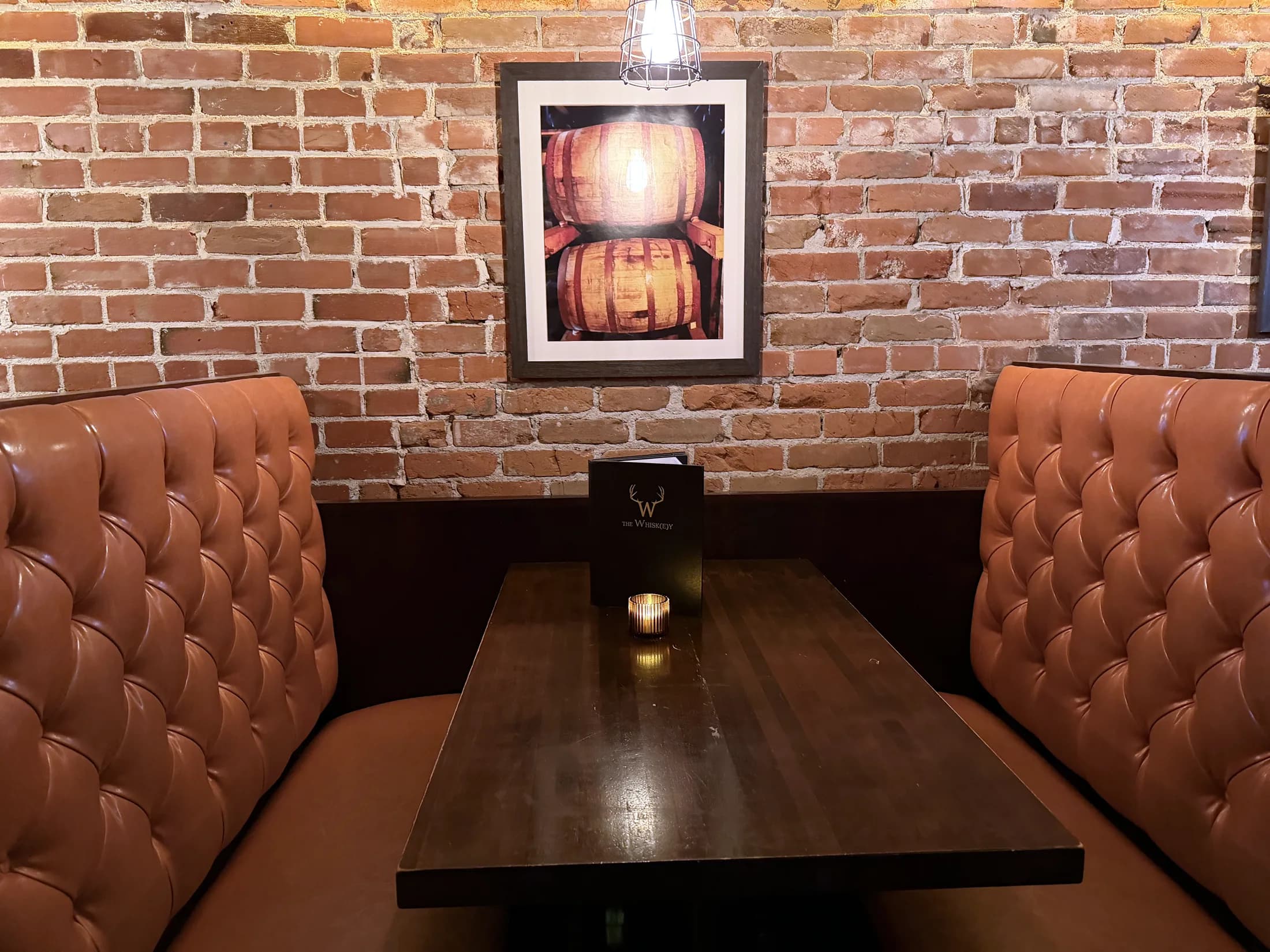 Booths and barrel art at The Whisk(e)y